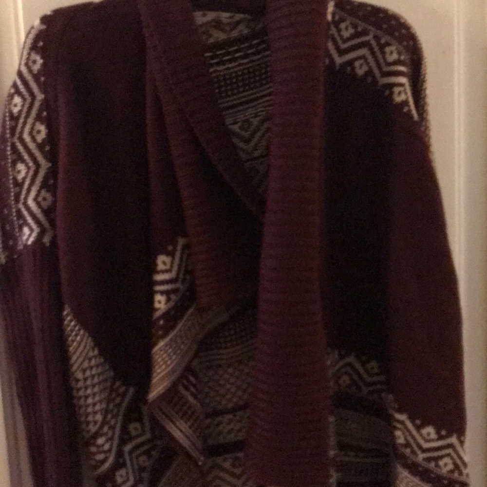A maroon long sleeve cardigan